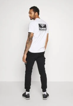 YOURTURN UNISEX - Jogginghose - Black -Mode Verkauf 37e11c7cc85b4c32935b63421ffc599f