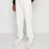YOURTURN TRIBAL EMBOSSED UNISEX - Jogginghose - Off White -Mode Verkauf 470288740d6e476aaa7cb8f14615d430